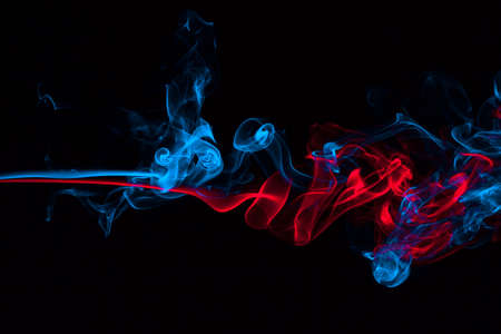 Blue smoke in the black abstract backgroundの写真素材