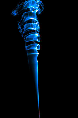 Blue smoke in the black abstract backgroundの写真素材