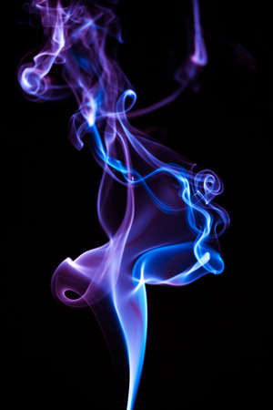 Blue smoke in the black abstract backgroundの写真素材
