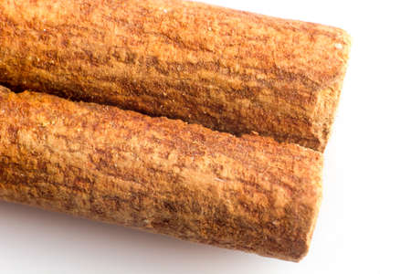 Cinnamon sticks isolated on the white backgroundの写真素材
