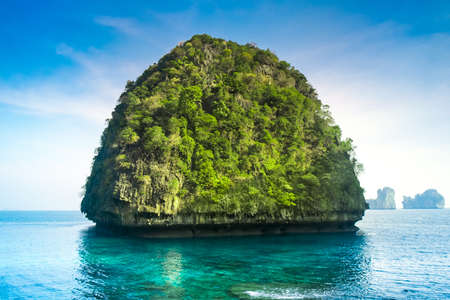 Tropical island in ocean , nice vacation backgroundの写真素材