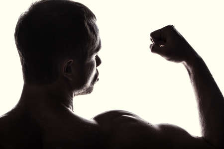 Handsome athlete on a white backgroundの写真素材