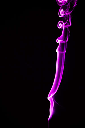 Mistery beautiful smoke on the black backgroundの写真素材