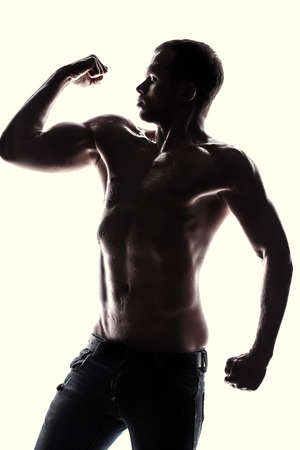 Handsome athlete on a white の写真素材