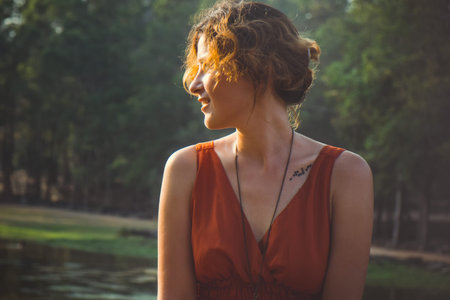 Girl posing in sunset Angkor Wat, Cambodiaの写真素材