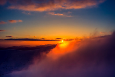 Winter landscape with a sunset. Ukraine, the Carpathian mountains.の写真素材