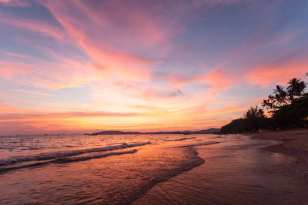 Tropical sunset on the beach. Ao-Nang. Krabi. Thailandの写真素材