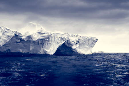 Antarctic iceberg in the snowの写真素材