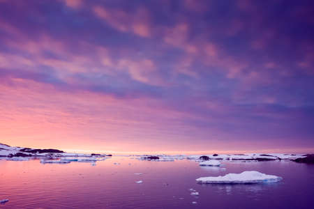 Summer  sunset in Antarctica.  Beautiful winter background.の写真素材