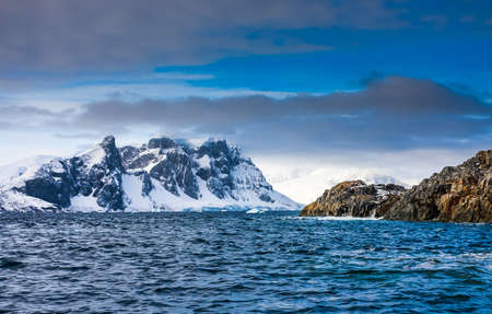 Beautiful snow-capped mountains against the blue sky in Antarctica. Vernadsky Research Base.の写真素材