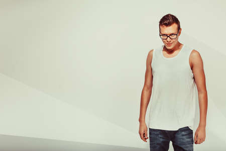 Portrait of smiley cute man over vintage backgroundの写真素材