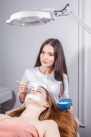 Facial treatment in a beauty salonの写真素材