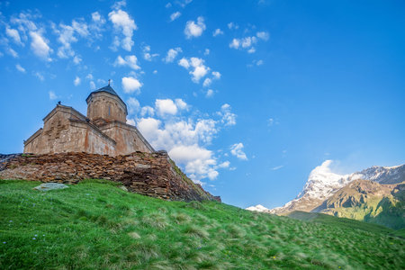 Holy Trinity Church near Mount Kazbek in Georgia. Tsminda Sameba. Mediaeval Church in mountains