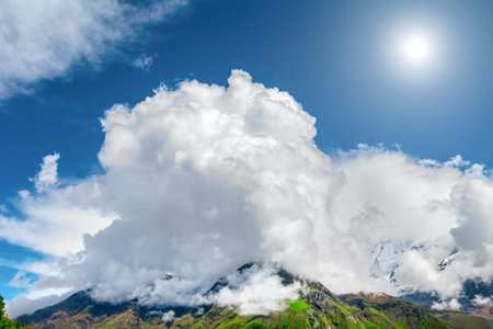 Beautiful mountains landscape with white clouds in Annapurna areaの写真素材