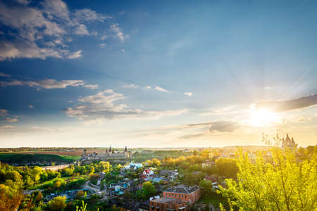 Kamianets Podilskyi cityscape under sunshine and colorful skyの写真素材
