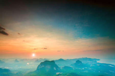 beautiful landscape with mountains and rocks under colorful sky in sunset in Thailandの写真素材