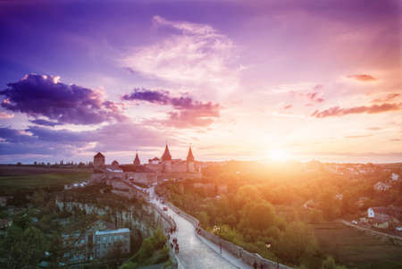 View on the castle in Kamianets-Podilskyi in the evening. Ukraineの写真素材