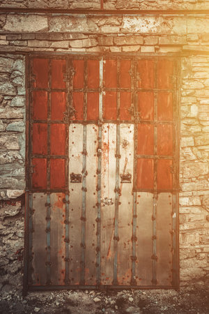 close up Old Wooden door with ornaments in ancient fortress
