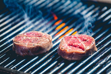 Delicious steak on the grill close upの写真素材