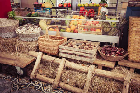 Variety of fresh fruits and vegetables in boxesの写真素材