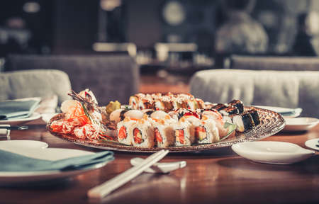 Japanese seafood sushi many tasty fresh Japanese sushi with tuna, caviar and shrimpsの写真素材