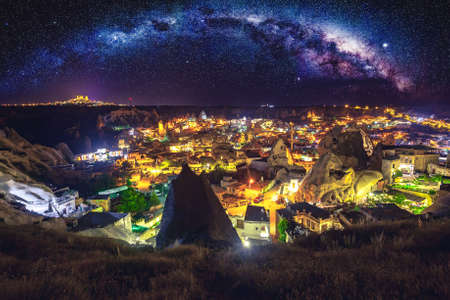 Ancient town and castle of Uchisar dug mountains, Cappadocia at night, Turkeyの写真素材