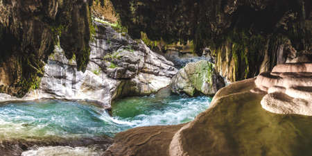 View of beautiful mountain waterfallの写真素材