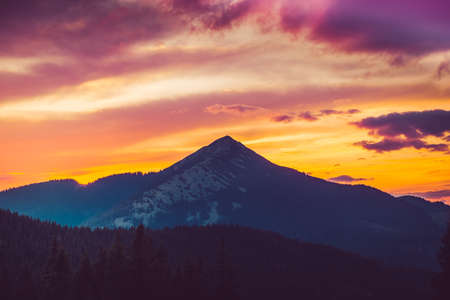 Majestic sunrise in montain landscape. Sunset time. Carpathian, Ukraine, Europe. Beauty world Vintage filterの写真素材