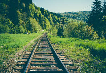 Rail goods path in the mountains on a background of mountain slopes and forest. Carpathians, Ukraineの写真素材
