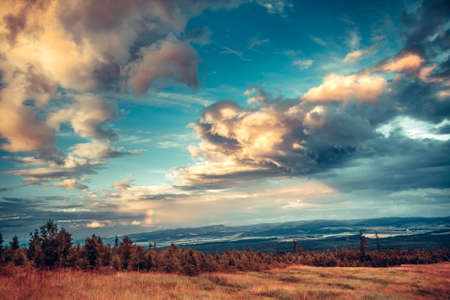 Fairy tale scenery the fantastic bright sky in white blue yellow shades. Splash of colors in the Tatras Mountains in Slovakia. Natural phenomena. Artistic retouching.の写真素材