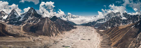 Breathtaking panoramic view in the Gokyo Lakes region. The mighty snow-covered mountain range on the way to the Everest Base Camp in the Nepal. Strength and beauty of the untouched nature.の写真素材
