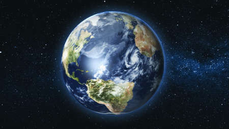 Realistic Earth Planet, rotating on its axis in space against the background of the Milky Way star sky. Astronomy and science concept. Continents and oceans.の写真素材