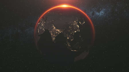 motion graph of approaching Earth silhouette with illuminated cities on mainlands against Sun creating halo. 3d animation. Science and technology concept.の写真素材