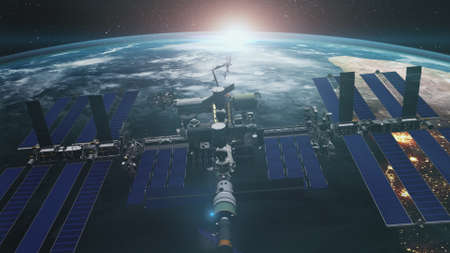 Close up of ISS orbiting realistic planet Earth. International Space Station revolving over ocean and mainland. Exploration mission. 3d render animation.の写真素材
