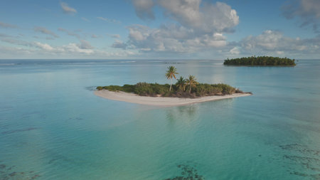 Aerial view panorama of stunning islet in Tikehau, French Polynesia, clear turquoise water, white...