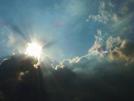 shiny thing in a hand sunsetの写真素材