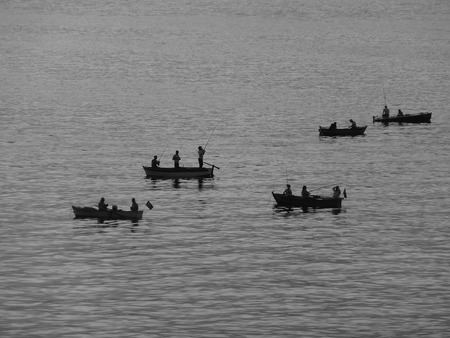 fishermans with rowing-boatsの写真素材