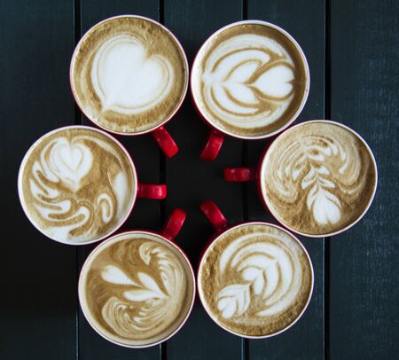 lattes on the tableの写真素材
