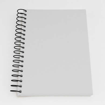 Notebook on  white の写真素材