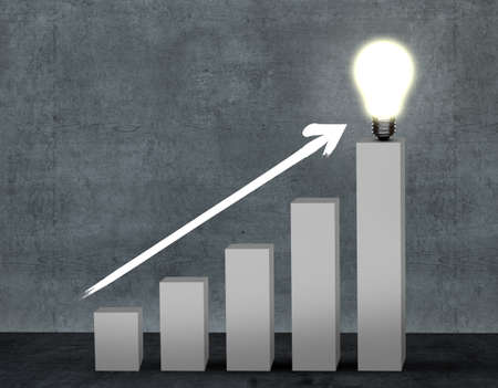 Business graph arrow and light bulb on backgroundの写真素材