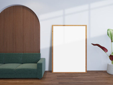 Empty picture frame mockup hanging on the wall of living room with sofa, plant decoration and wooden texture. Mockup for presentation photography, art gallery, poster, painting. Modern interior designの写真素材