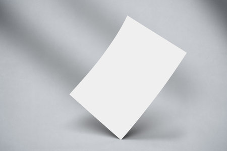 Flyer A4 Mock up with shadow overlay. Template for magazine, poster, flyer, newspaper, branding identity.の写真素材
