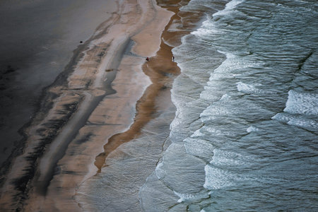Aerial view of the beach and sea waves. Nature composition. Norway