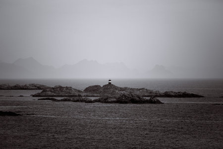Lighthouse on a rocky island in the sea. Norwayの写真素材