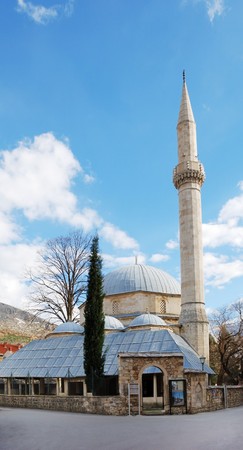 Karadjozbeg Mosque in Mostar, Bosnia and Herzegovina with blue sky in background.の写真素材