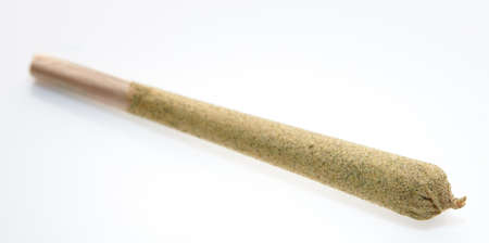 Alternative medicine marijuana cbd rolled kief joint on white background selective focusの写真素材