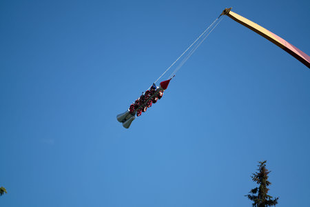 Amusement park rides with a very blue sky as background