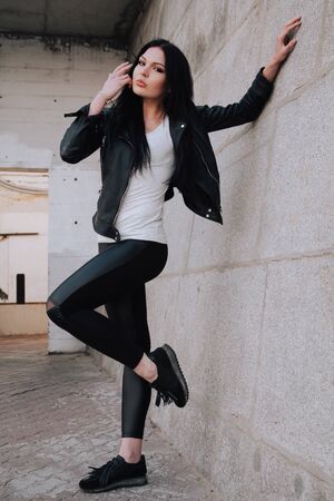 attractive fitness woman lifestyle portrait. caucasian model walking in the cityの写真素材