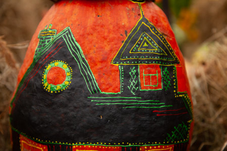 pumpkins in honor of the celebration of autumn and Halloween. festival of vegetables, creative house...