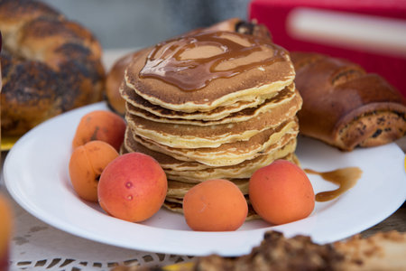 sweets on a table in the gardenの写真素材